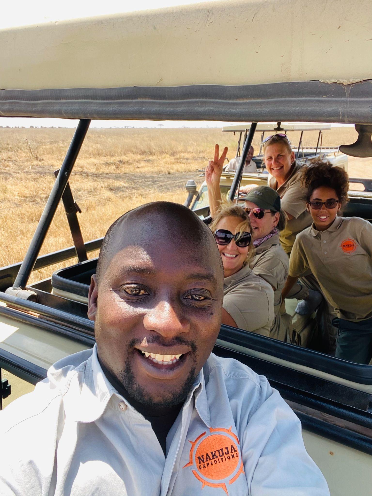 People enjoying a safari in a Jeep