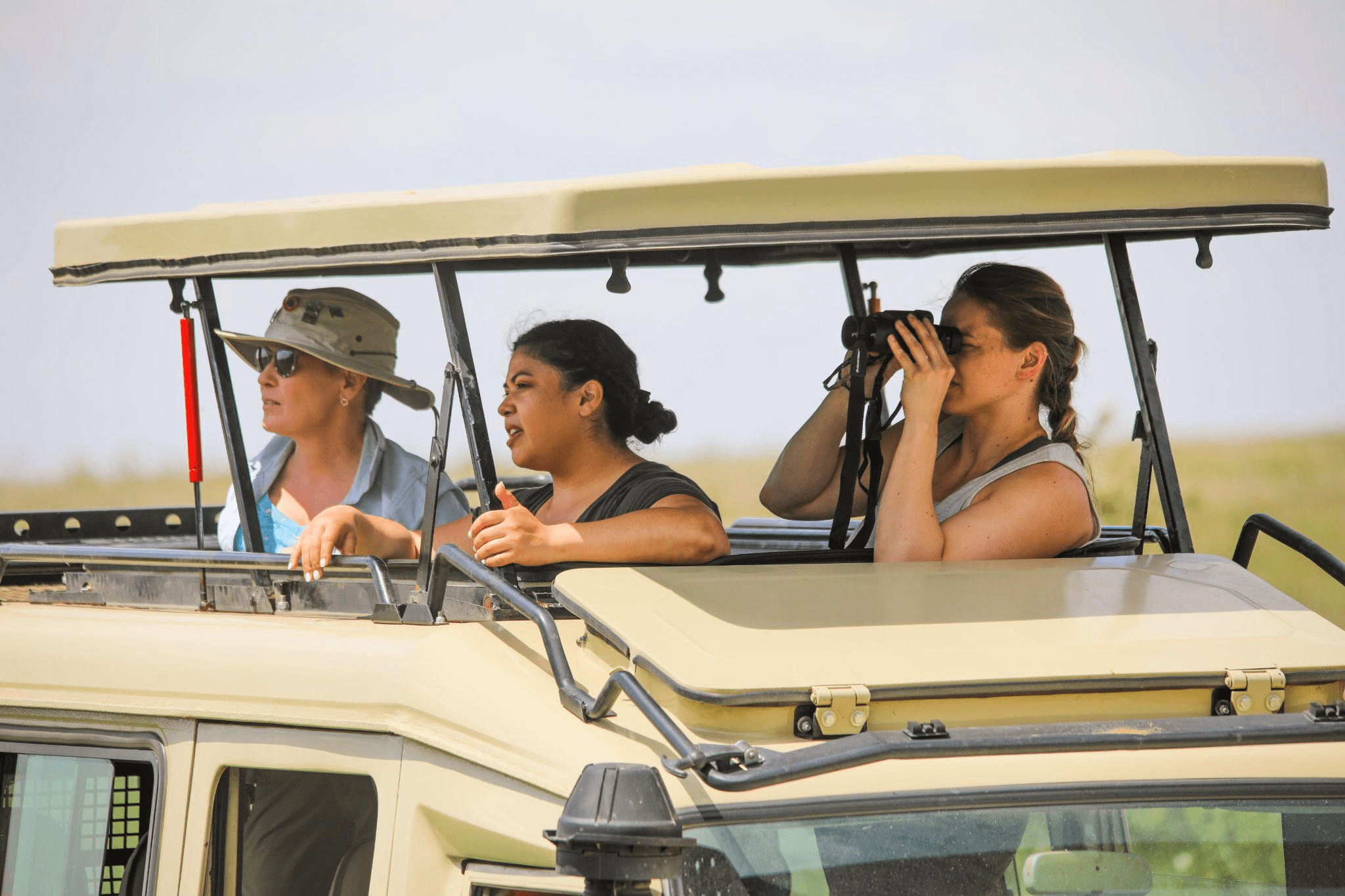 A family in a Jeep